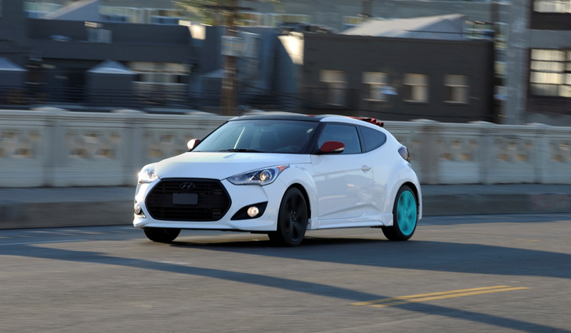 Illustration for article titled The Hyundai Veloster C3 Roll Concept Is A Veloster With Less Roof And More Bicycle